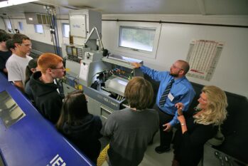 Michael Medeiros touring students at North Easton Machine