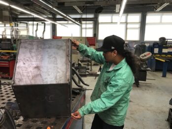 Welding Trainee Measuring Fire Pit