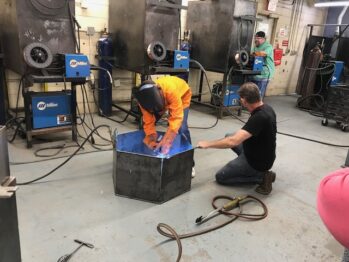 Welding Instructor and Trainee