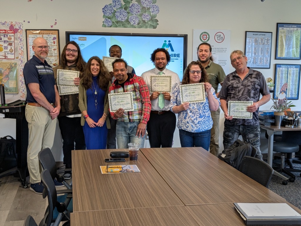 MACWIC training granduates, instructor, and program manager